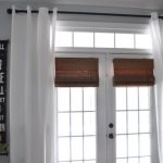 these window treatments exactly: bamboo shade, breezy white curtain