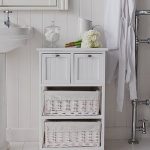 Creative ways to spruce up your white bathroom storage cabinet