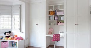 Floor to ceiling fitted #wardrobes with #desk area in #white satin