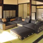 Japanese living room: style of couch, floor mats, and katana stand