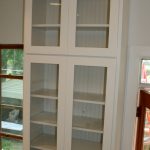 Get perfect kitchen wall cabinets with glass doors for storage