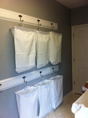 space saving laundry ideas | Hanging space saving laundry hampers