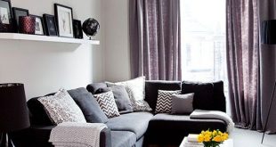 Grey traditional living room with purple soft furnishings