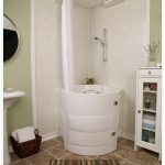 This soaking tub with shower is a walk-in bathtub designed for use