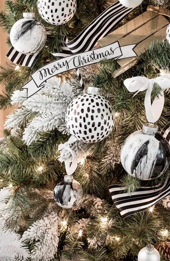 fabulous pola dot and marble black and white Christmas ornaments and striped black and white garlands are amazing for Christmas tree styling