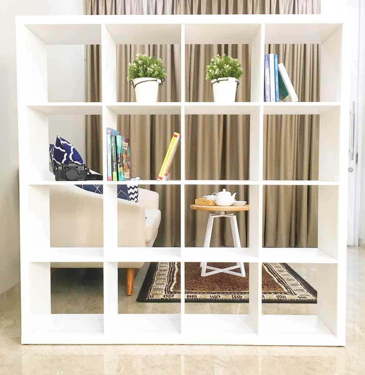 white temporary bookshelf in small living space