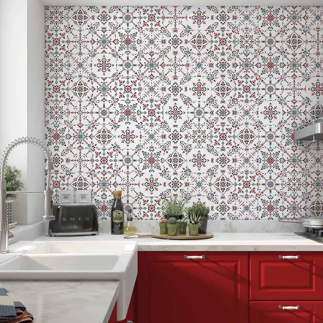 Unique patterned wallpaper in red cupboard kitchen with apron sink