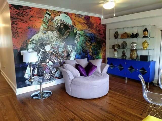 Vibrant Astronaut Mural Living Room Purple Sofa 