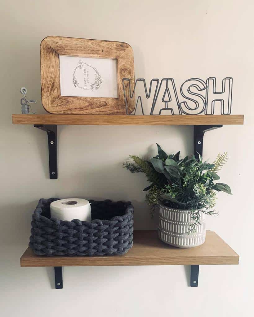 Bathroom wooden shelf with wash sign and potted plant 