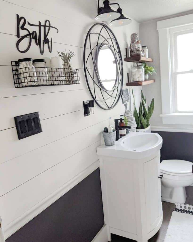Freestanding white sink with shiplap on wall, small farmhouse bathroom 