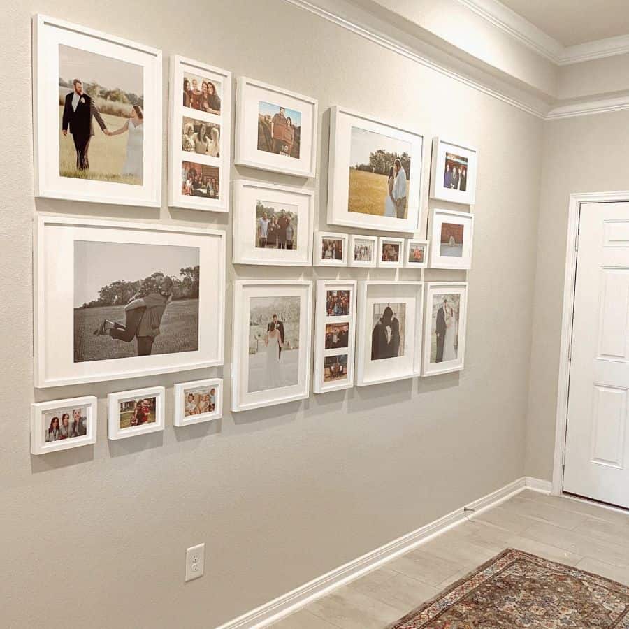 Framed couple photos as wall art in the hallway 