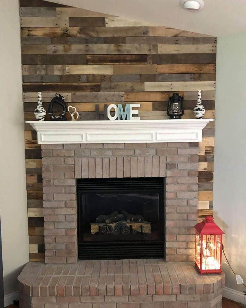 With wooden paneling, wall, brick fireplace and red lantern 