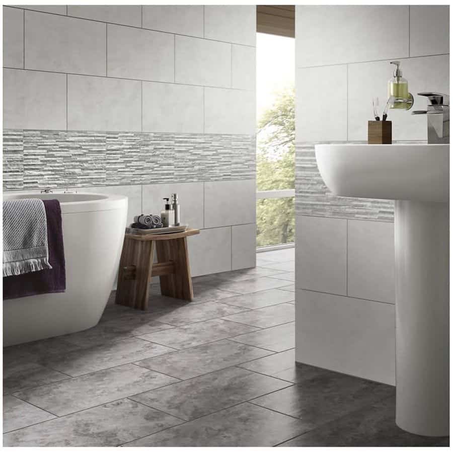 Bathroom with white tiled walls 
