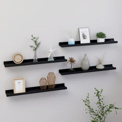 The Beauty of Black Floating Wall Shelves