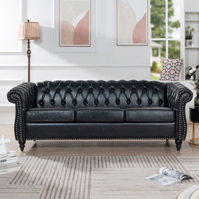 The Timeless Elegance of a Black Leather Chesterfield Sofa