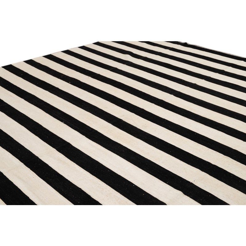 Classic Monochrome Charm: The Timeless Appeal of Black and White Striped Rugs