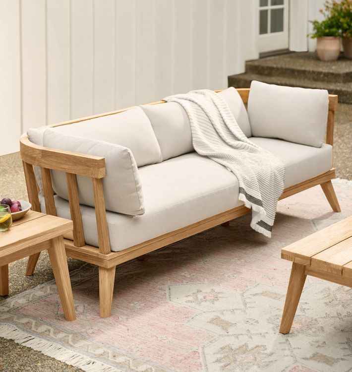 Enhance Your Living Room with a Wooden Frame Sofa and Cozy Cushions