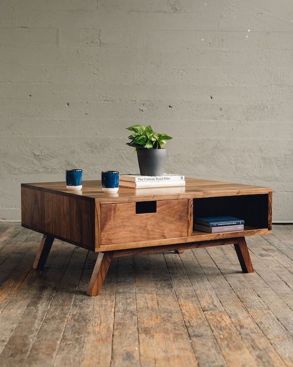 Stylish and Functional Wood Coffee Table with Ample Storage Space