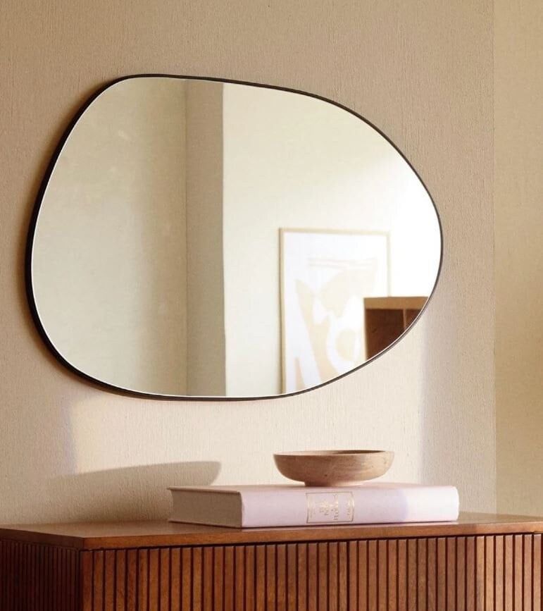 The Beauty and Functionality of a Spacious Bathroom Mirror