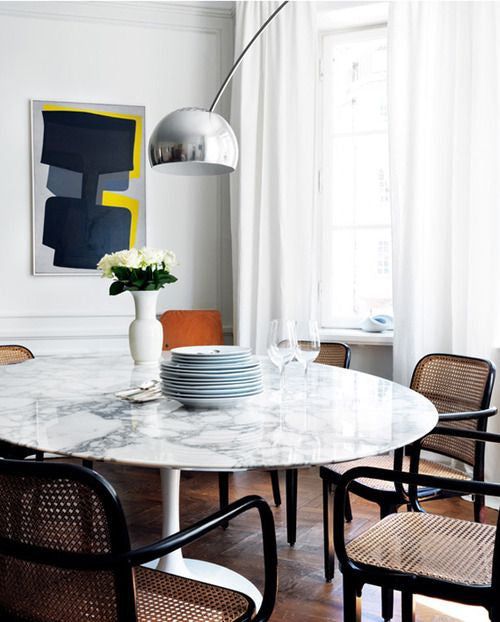 The Beauty of a White Gloss Dining Table: A Stunning Addition to Your Home