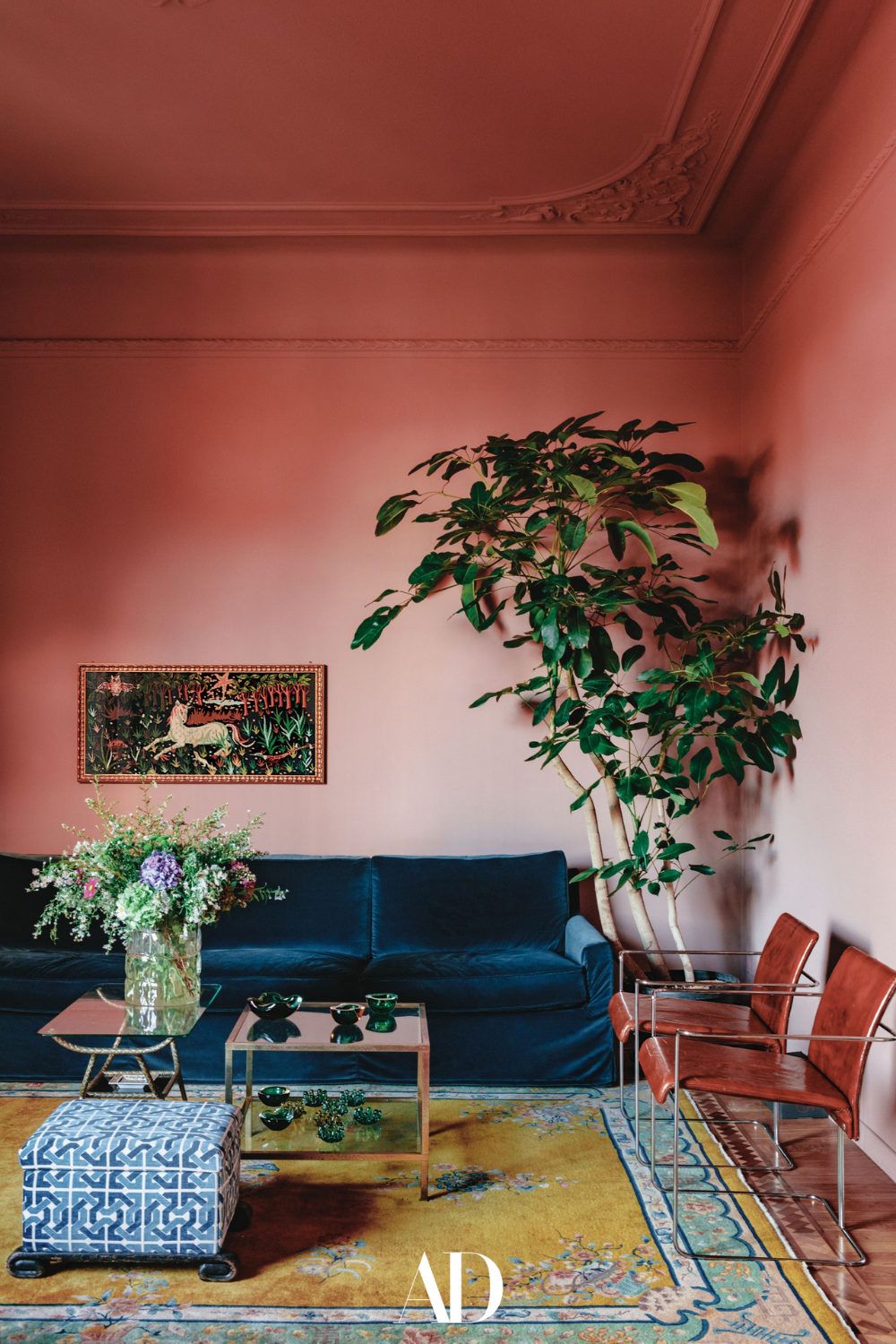 The Elegance of a Blue Leather Chair and Ottoman