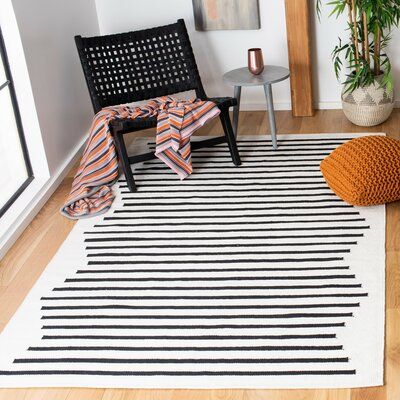 The Timeless Charm of Black and White Striped Rugs