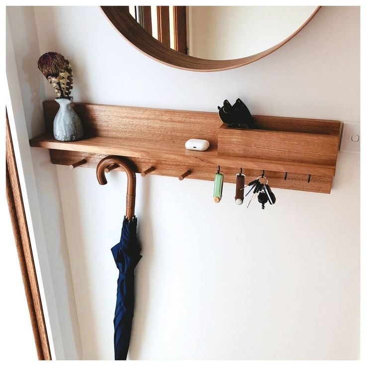The Ultimate Entryway Organizer: Mirror with Hooks and Shelf