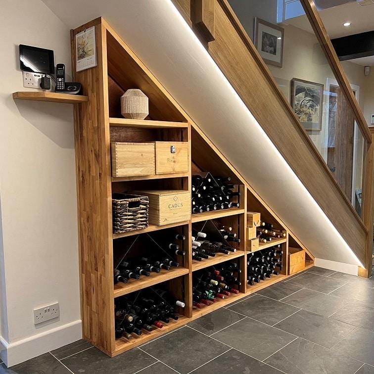 Design a charming wine rack built into your Under Stairs Kitchen