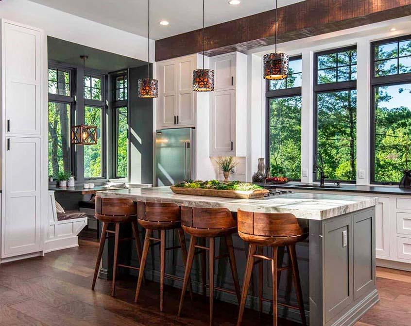 Natural materials like wood and stone bring warmth to your farmhouse kitchen