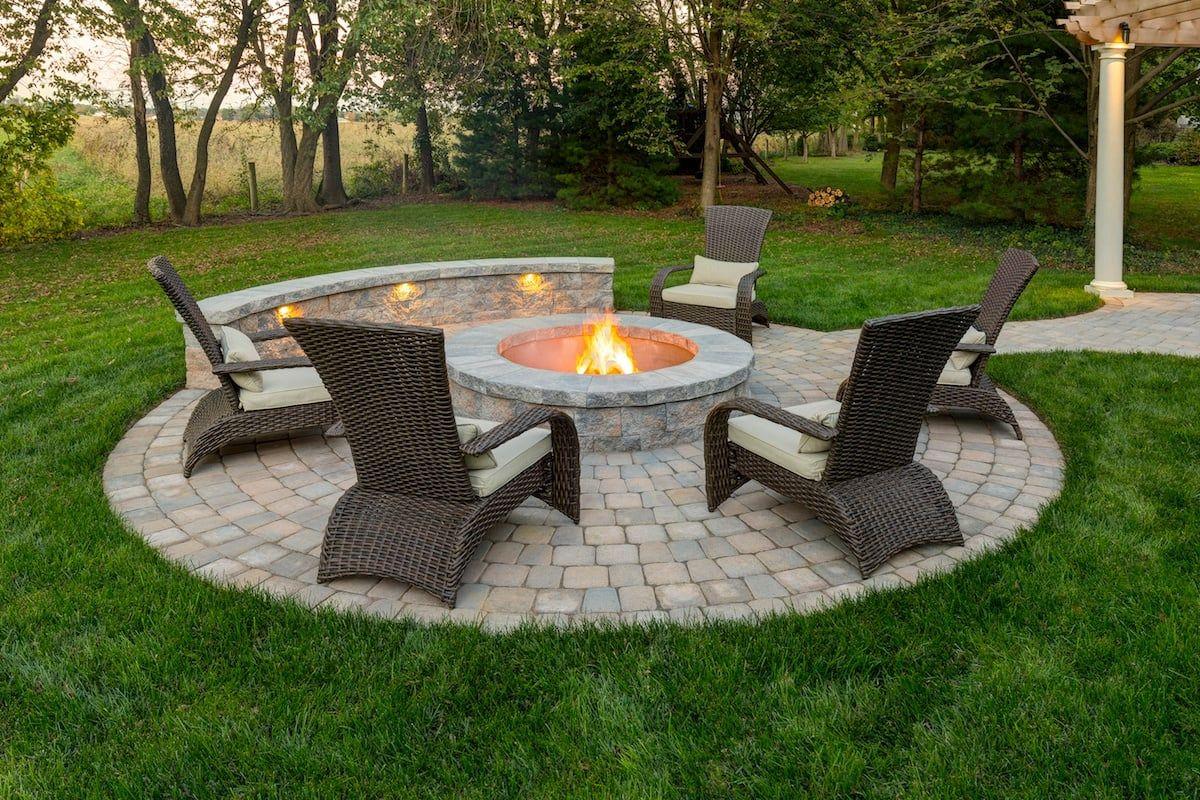 Incorporate a cozy fire pit for perfect evenings in your backyard design