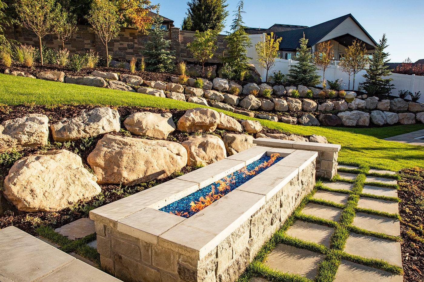 Use boulders ​and ​stones for natural borders, adding texture to⁢ your landscaping ​design