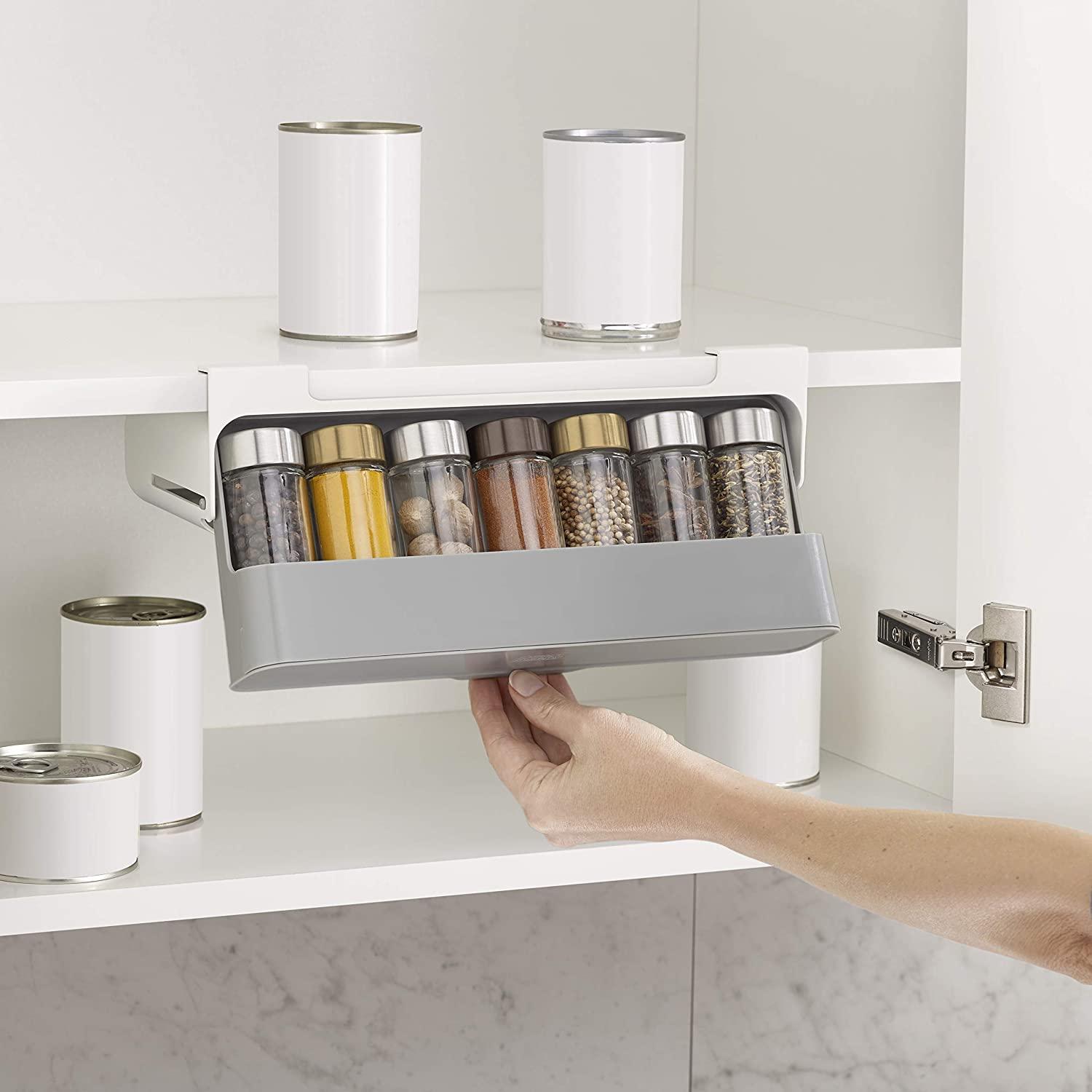 Implement a ‍magnetic spice rack on walls in your Under ​Stairs Kitchen