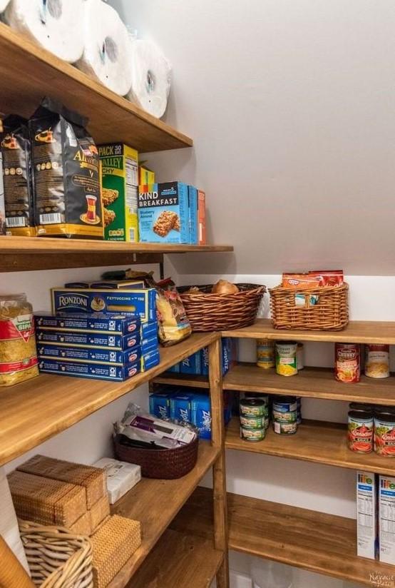 Use baskets for organized storage in your Under Stairs Kitchen