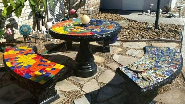 Experiment with patterns using mosaic tiles in your creative patio design