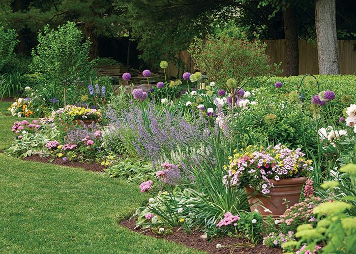 Add colorful flower borders to your landscaping design for vibrant seasonal highlights