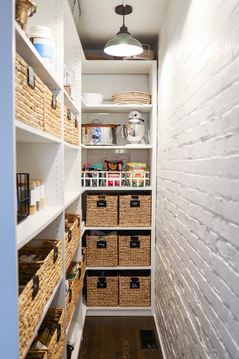 Use stackable containers to organize dry goods in your Under Stairs Kitchen