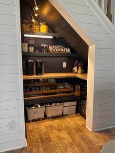 Install a sliding door for easy access in your under stairs kitchen area