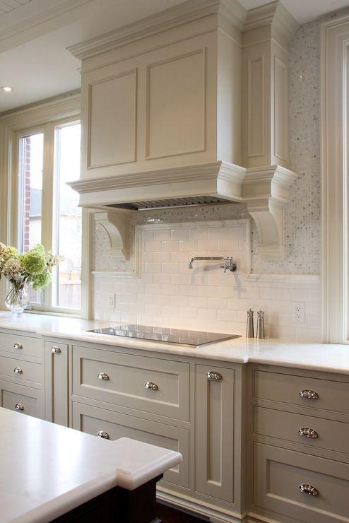 Paint cabinets in light colors for an airy feel in your galley kitchen