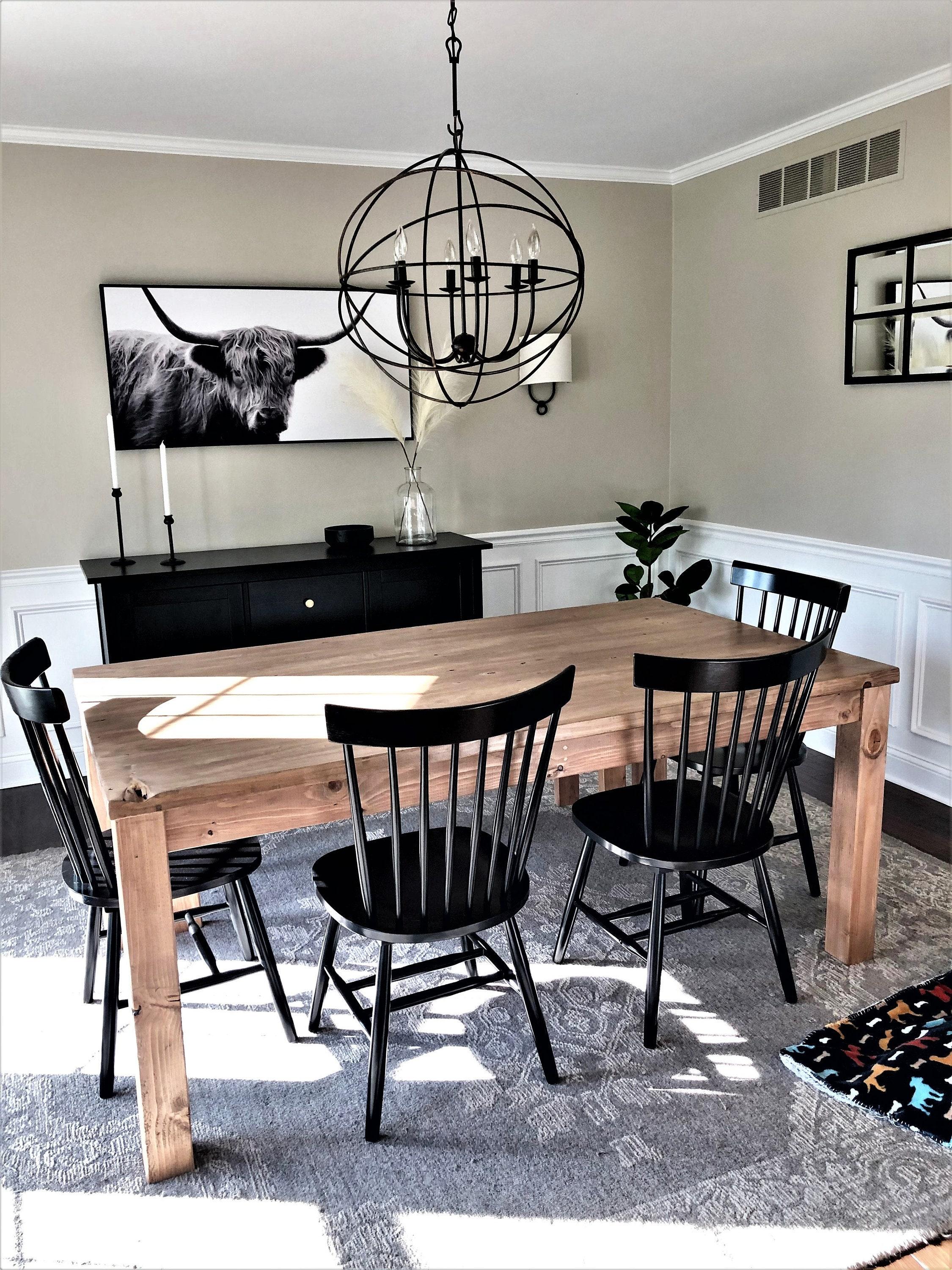 Rustic ⁤wooden farmhouse dining table, a ‍centerpiece ⁢for family gatherings in your farmhouse kitchen