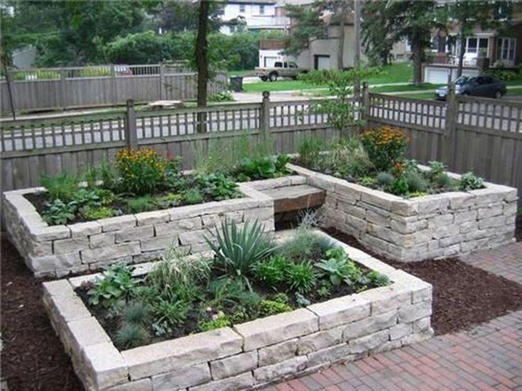 Use raised garden beds for organized structure in your front yard design