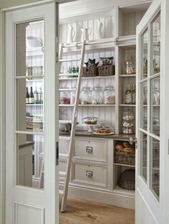 A large pantry ensures ample storage ​in​ a busy country kitchen