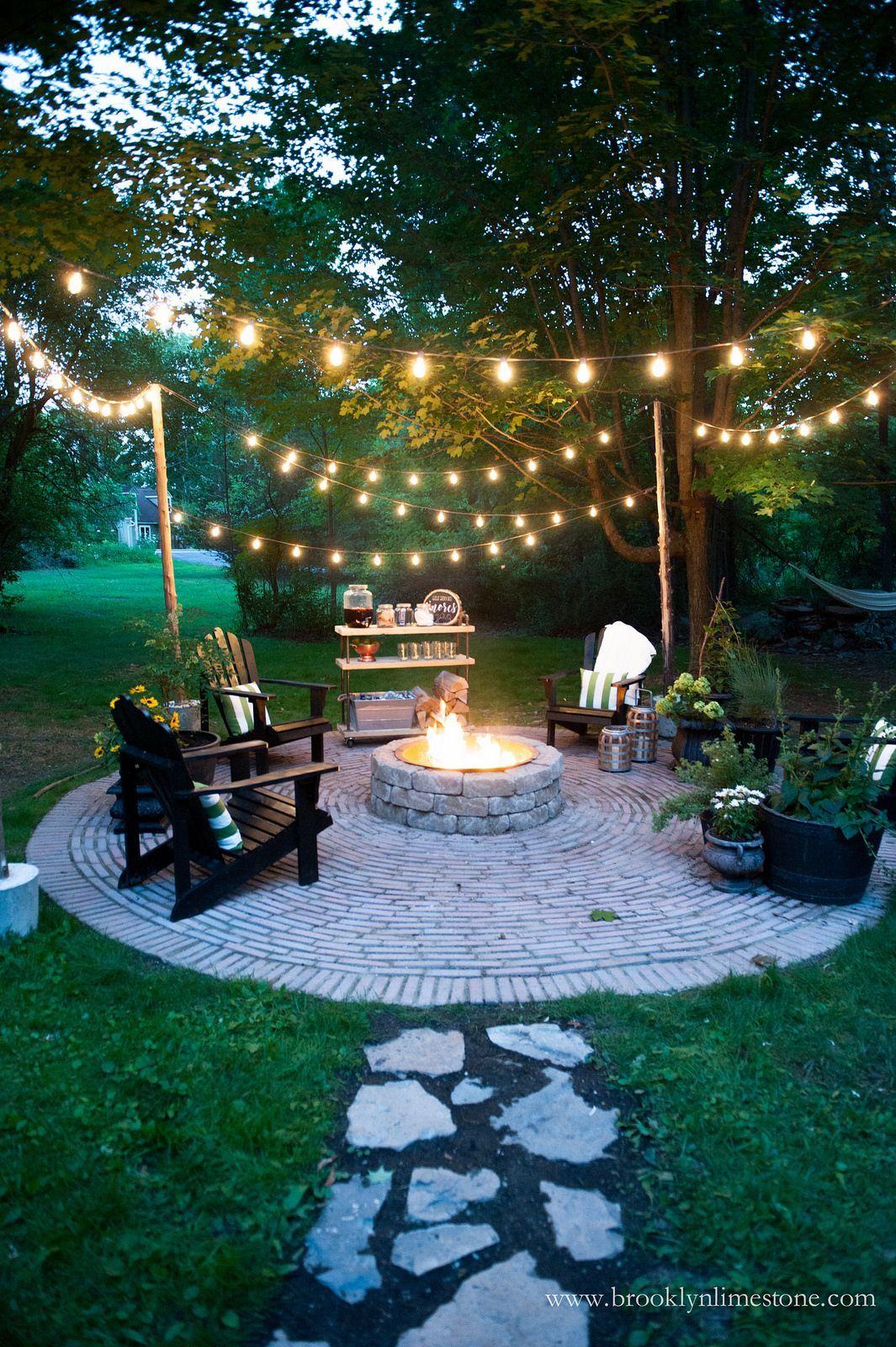 Use string lights to bring warmth and ambiance to your backyard design