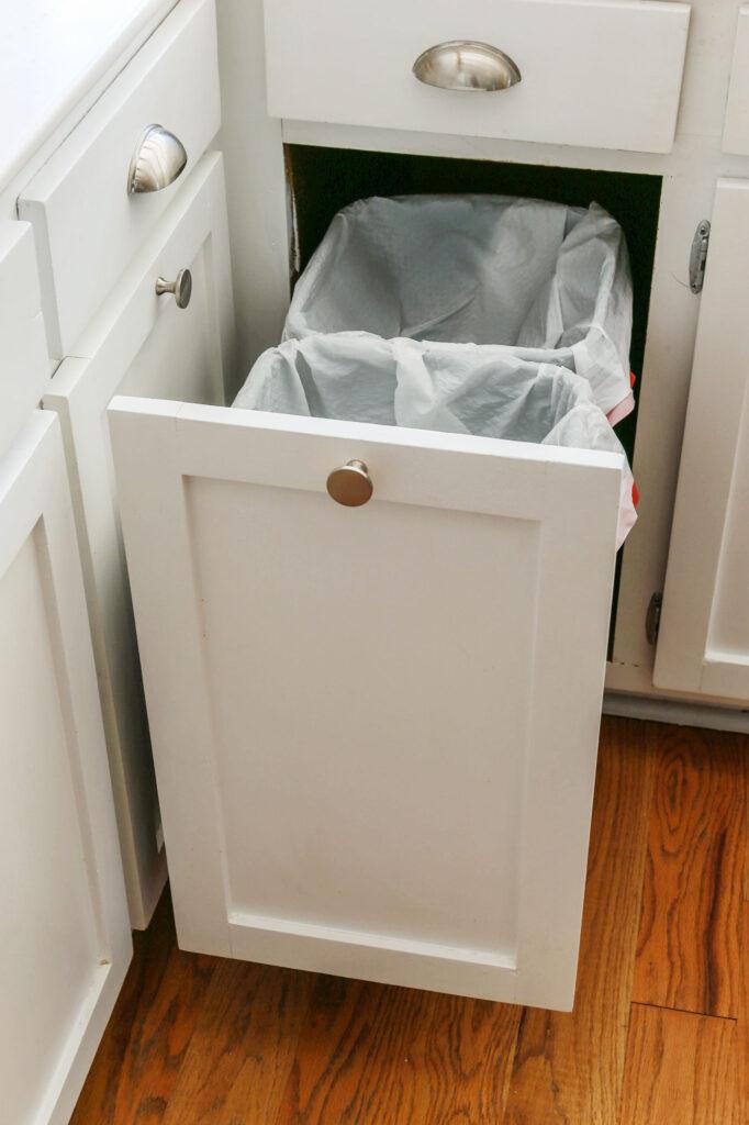 Strategically place trash bins for easy disposal in your galley kitchen layout