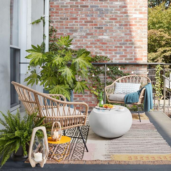 Embrace minimalism with sleek furniture in your small patio design