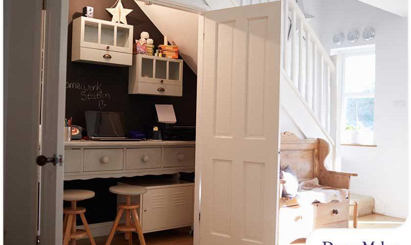 Outline a cozy reading corner in your Under Stairs Kitchen with comfortable seating