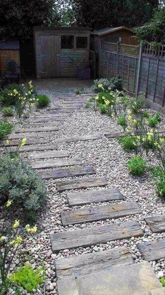 Design pathways ⁢with​ stone or‍ gravel for ⁤a​ rustic appeal