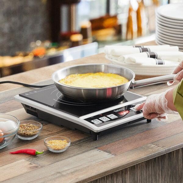 Induction​ cooktops⁣ offering precision cooking and​ safety⁢ features in your modern kitchen