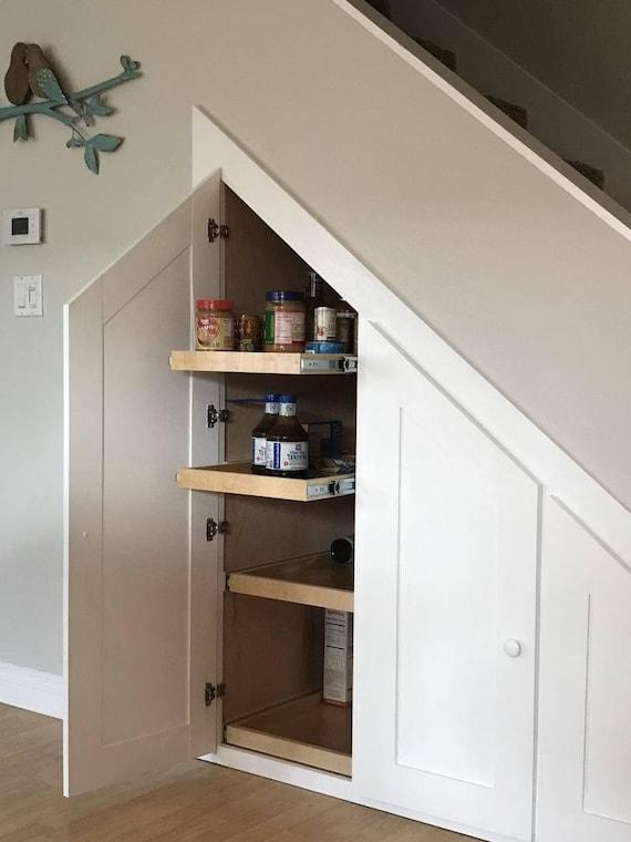 Utilize corner cabinets in your under stairs kitchen to maximize storage solutions