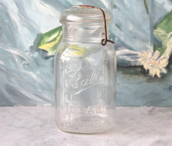 Vintage mason jars for storing dry‍ goods in your charming farmhouse kitchen