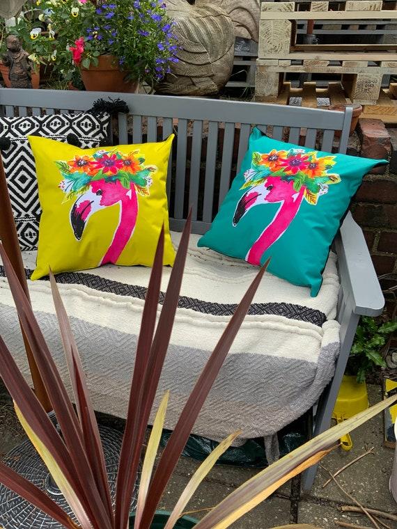 Use‌ colorful outdoor ​cushions to brighten up seating areas ​in your backyard ⁣design